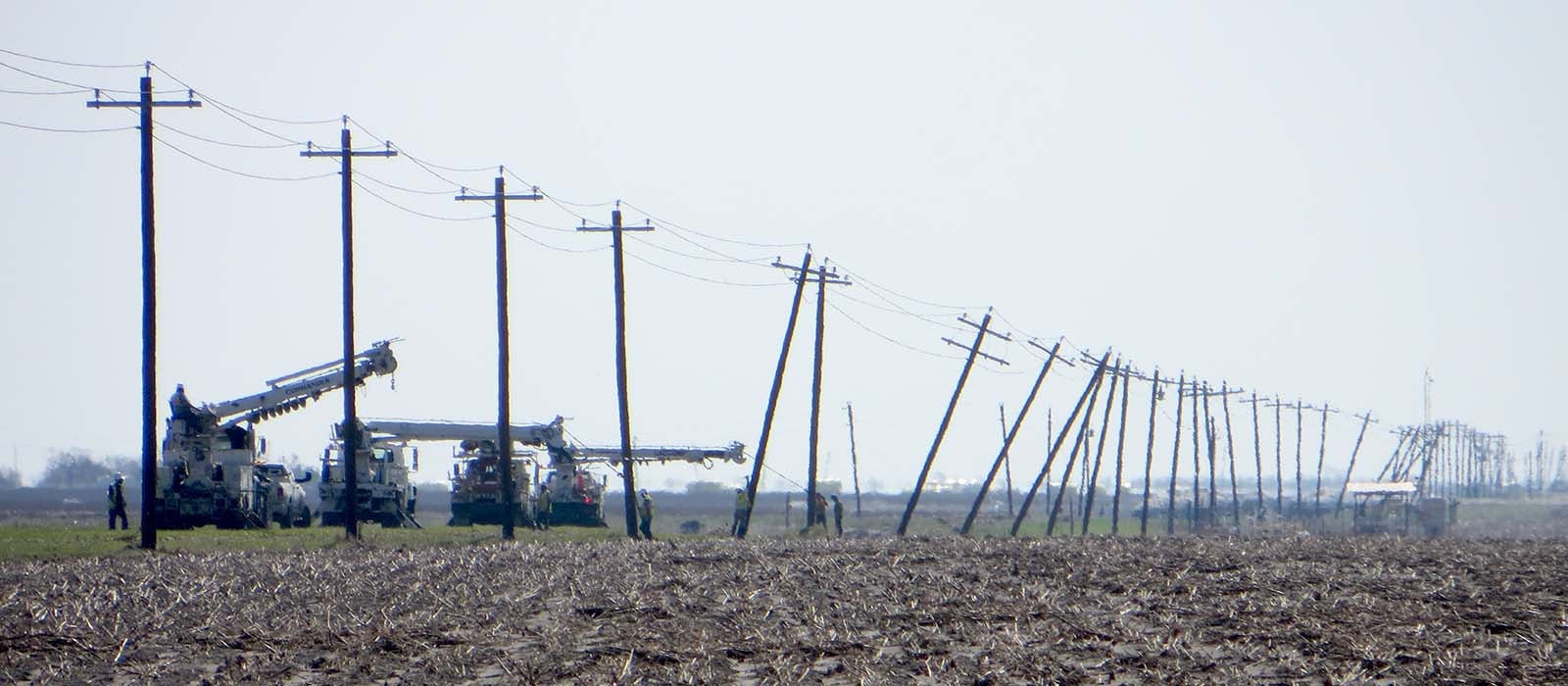 Bucket Trucks straightening poles